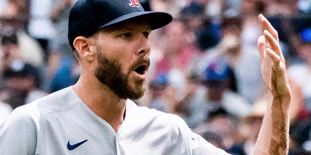 A close-up look at Boston Red Sox starting pitcher Chris Sale as he walks off the mound after a hand injury during the first inning of a game against the New York Yankees Sunday, July 17, 2022, in New York.