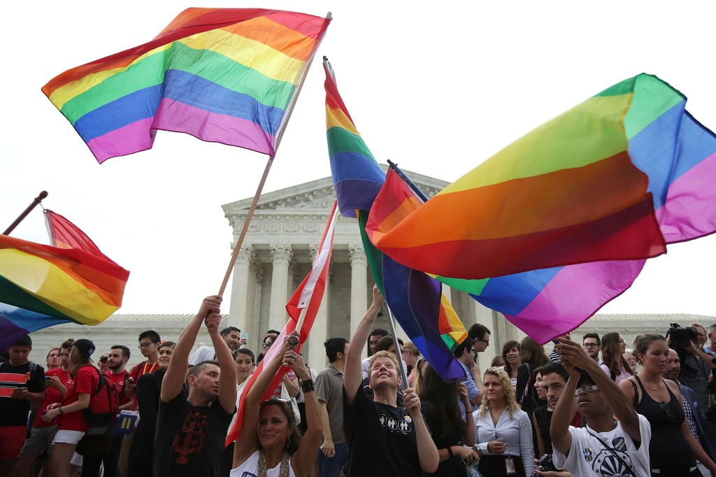 Pride flags waving in front of the Supreme Court