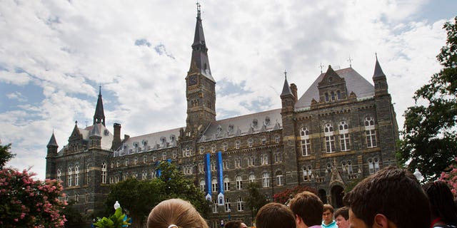 Prospective students tour Georgetown University's campus, on July 10, 2013, in Washington. 