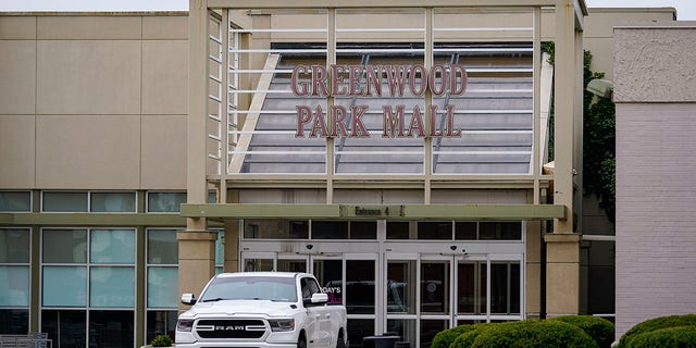 A truck blocks the entrance to the closed Greenwood Park Mall in Greenwood, Indiana, on Monday.