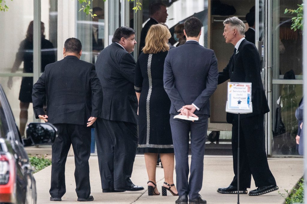 Illinois Gov. J.B. Pritzker, second from left, arrives for the funeral service for Jacquelyn Sundheim.