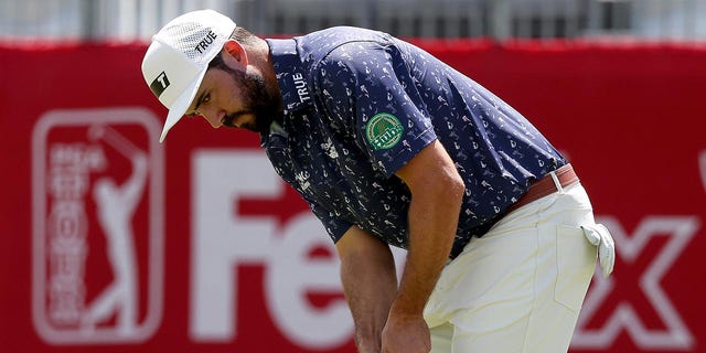 Mark Hubbard of the United States putts on the 17th green during the second round of the Rocket Mortgage Classic at Detroit Golf Club on July 29, 2022, in Detroit, Michigan.