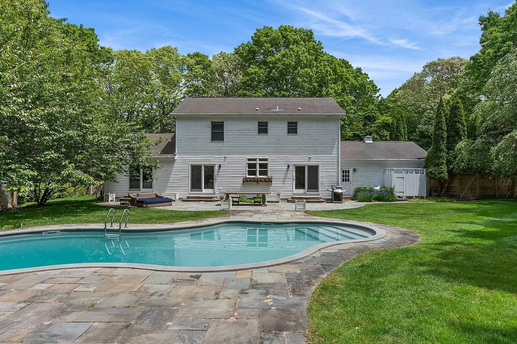 The backyard with a pool