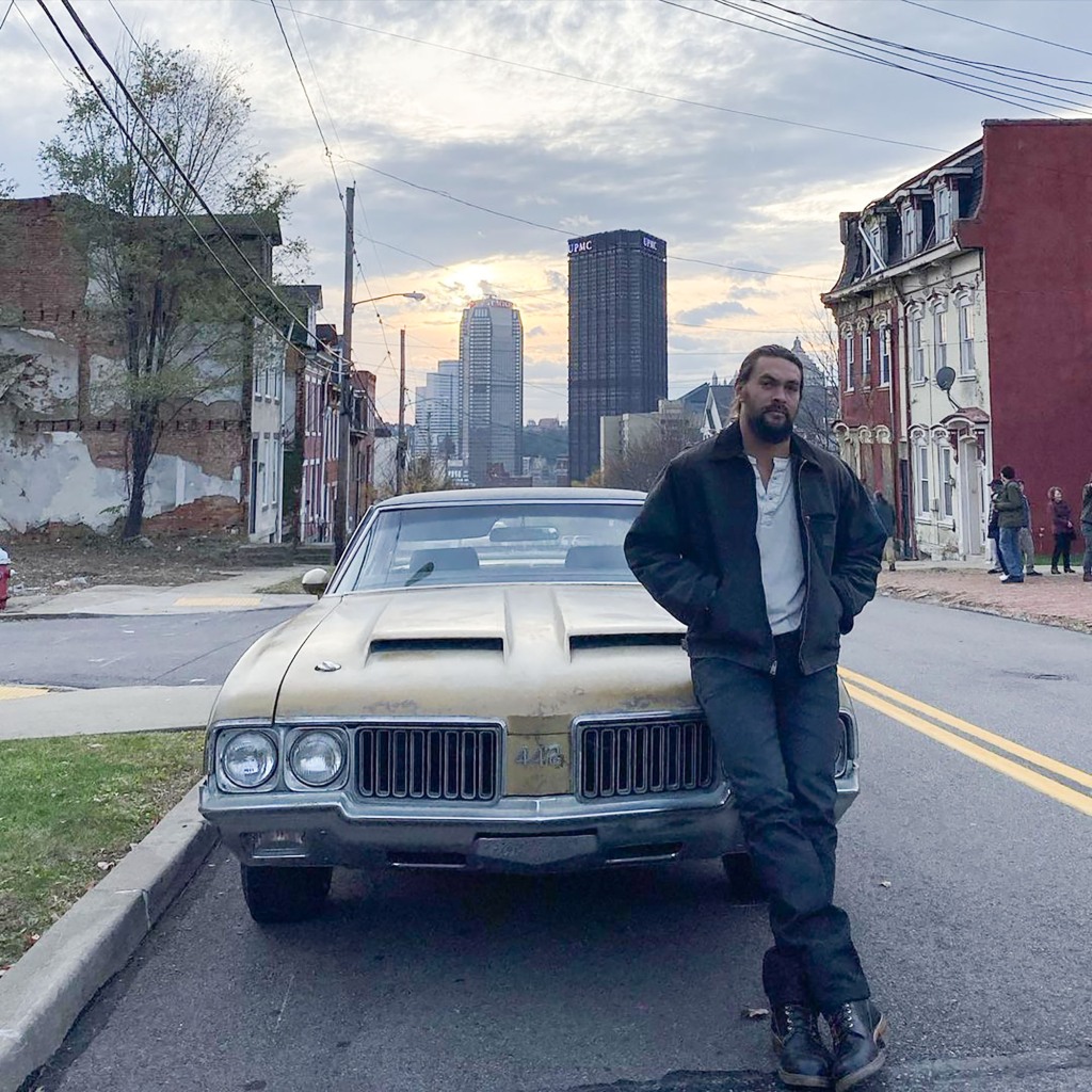 Momoa is pictured with his beloved 1970 Oldsmobile in a recent Instagram photo. 
