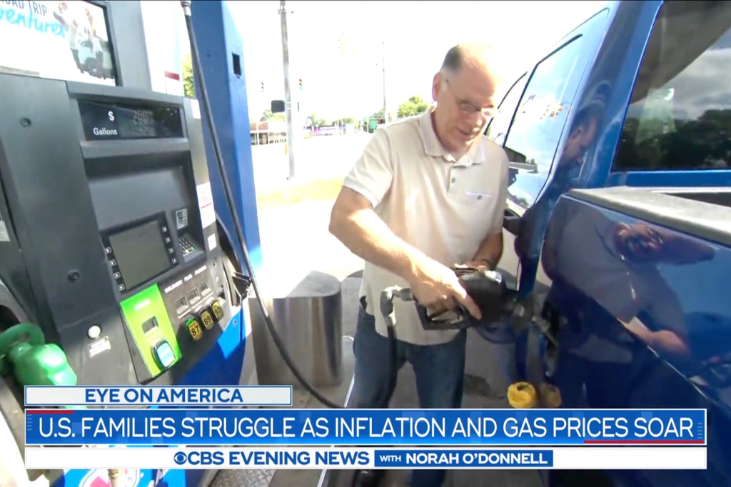 Keith is seen at the pump. He says his family is now forking out over $200 a week for gas. 