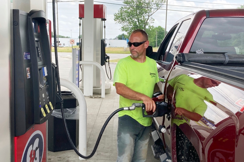 Man pumps gas