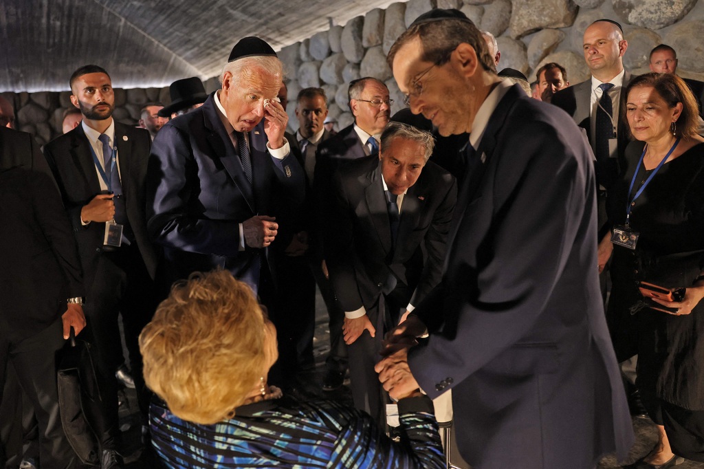 US President Biden (left) and Secretary of State Antony Blinken (left) speak with Holocaust survivor Rena Quint, at the Hall of Remembrance of the Yad Vashem Holocaust Memorial museum.