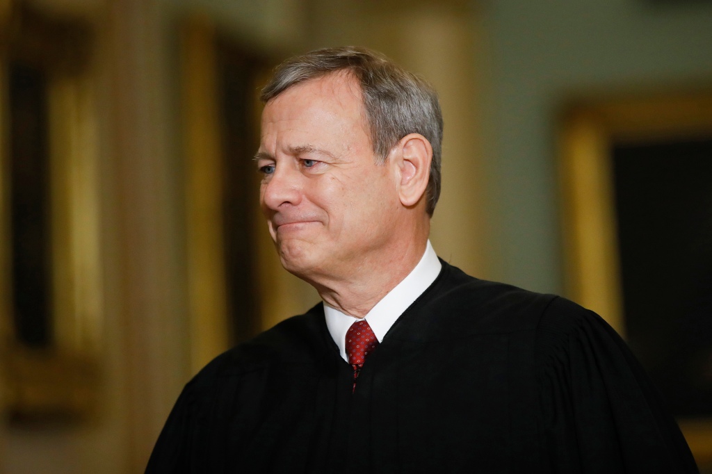 Chief Justice of the United States, John Roberts walks to the Senate chamber at the Capitol in Washington, Jan. 16, 2020.