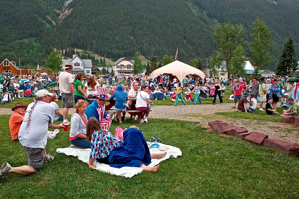 Families picnic and lounge at a park in Silverton, Colorado, during the 4th of July, circa 2010.