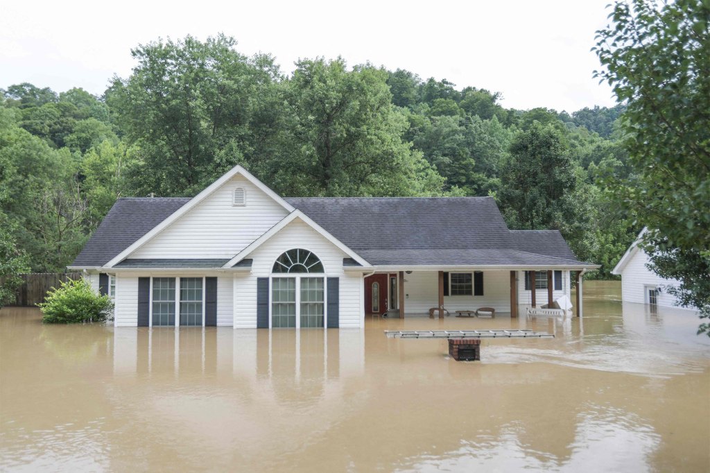 A house half submerged by flood waters from the North Fork of the Kentucky River in Jackson, Kentucky, on July 28, 2022.