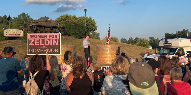 Congressman Lee Zeldin stands on stage during his stump speech, before an alleged attack on him, in Fairport, New York, United States, July 21, 2022. 