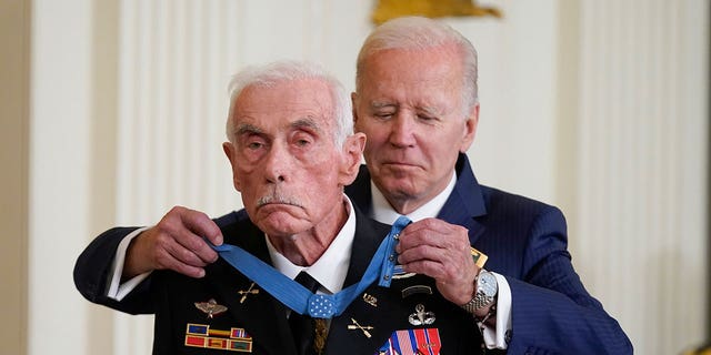 President Joe Biden awards the Medal of Honor to retired Maj. John Duffy for his actions on April 14-15 1972, in Vietnam, at the White House, Tuesday, July 5, 2022.