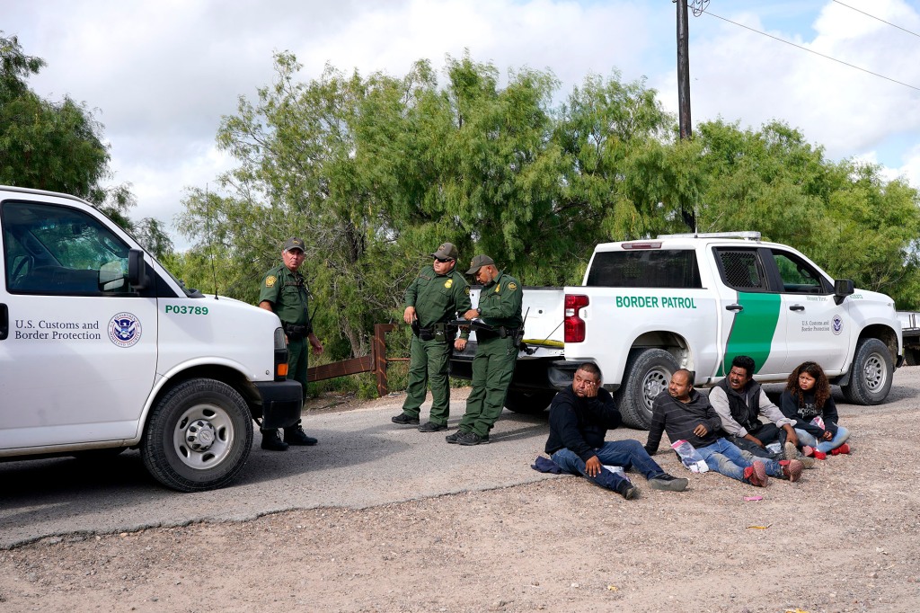 Migrants are detained by US Border Patrol on the second day of the implementation of the “Credible Fear and Asylum Processing Interim Final Rule” on June 1, 2022 in La Joya, Texas,
