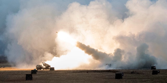 U.S. Army soldiers fire an M142 High Mobility Artillery Rocket System at Fort Greely in Alaska in October.