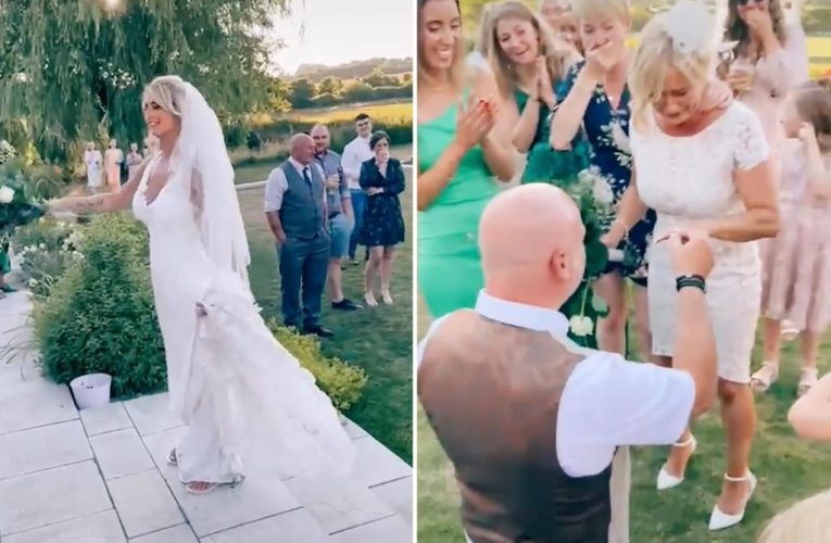 Guests speechless as mom gets engaged at daughter’s wedding