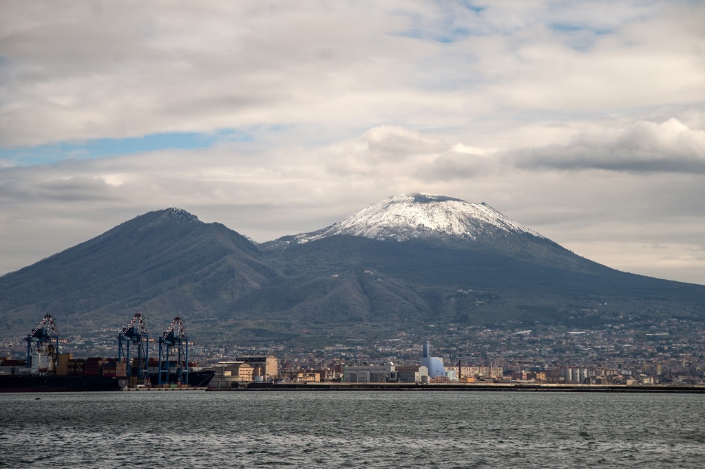 A snow-capped Mount Vesuvius as seen from the Maritime Station in Naples, Italy on on March 20, 2021.