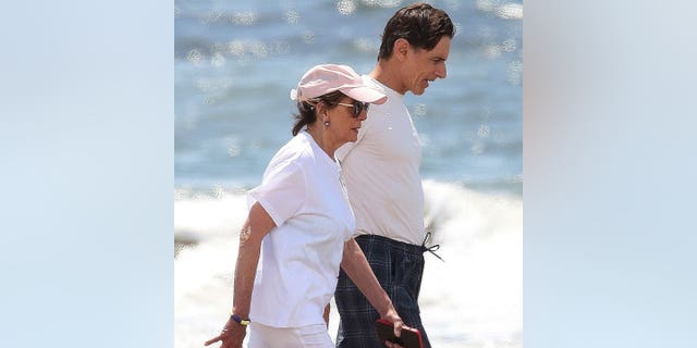 House Speaker Nancy Pelosi, D-Calif., walks the beach in Italy over Independence Day weekend.