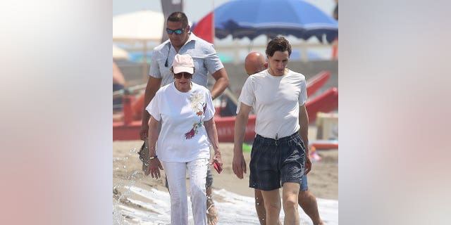 House Speaker Nancy Pelosi, D-Calif., walks the beach in Italy over Independence Day weekend.