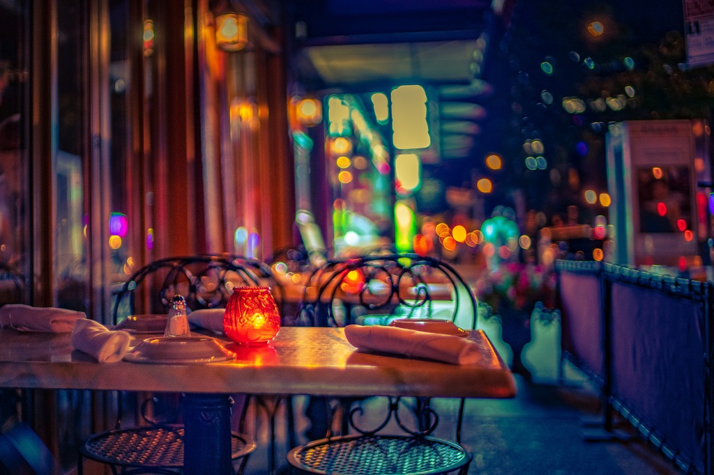 A table waiting for late night customers on a NYC sidewak.