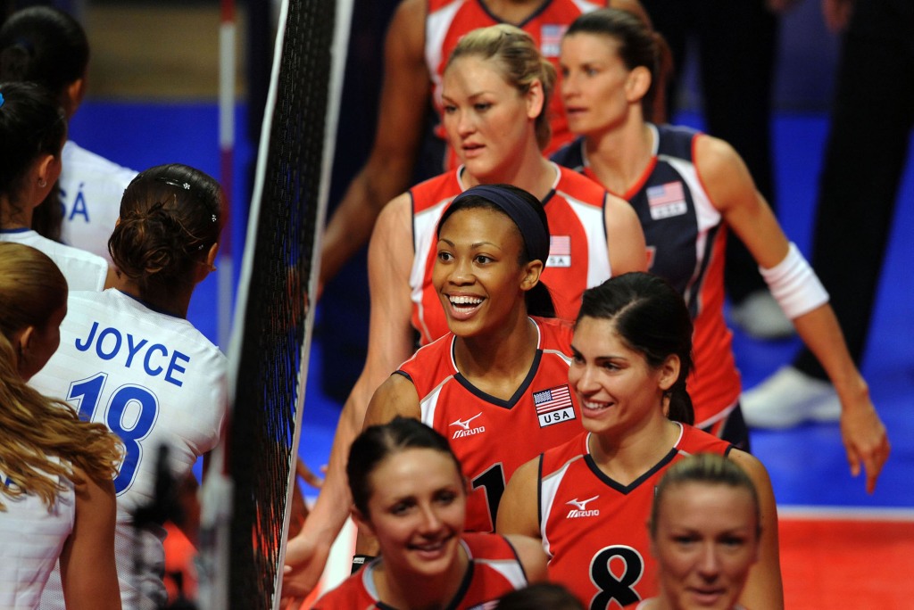 COLORADO SPRINGS, CO - JUNE 14: Kim Glass #10 of the USA greets players for team Brazil before the volleyball match between the USA Women's National Volleyball team and Brazil on June 14, 2008 at Clune Arena at the US Air Force Academy  in Colorado Springs, Colorado (Photo by Steve Dykes/Getty Images)