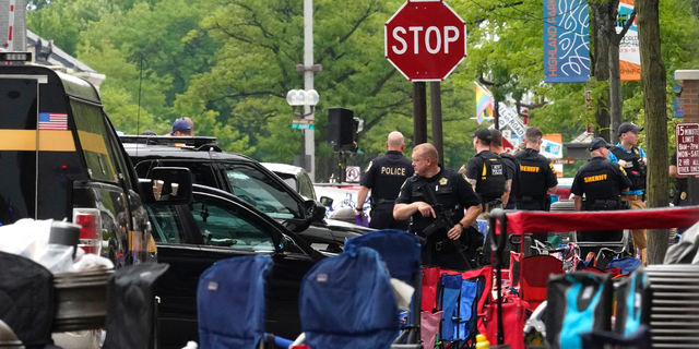 Police at scene of HP, IL Fourth of July parade after shooting 