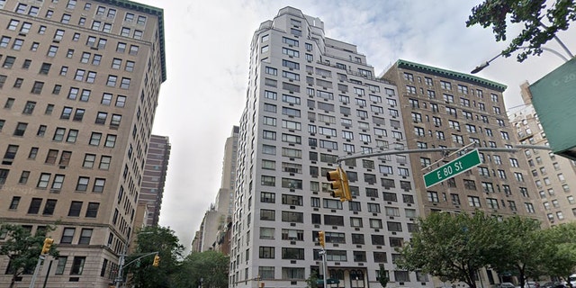 The man dropped from a rear window on the sixth floor of the 21-story building at 920 Park Ave. on the Upper East Side.