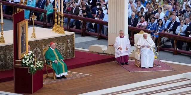 Pope Francis presides over a Mass celebrated by Cardinal Kevin Joseph Farrell in St. Peter's Square in Rome for the World Meeting of Families, June 25, 2022.