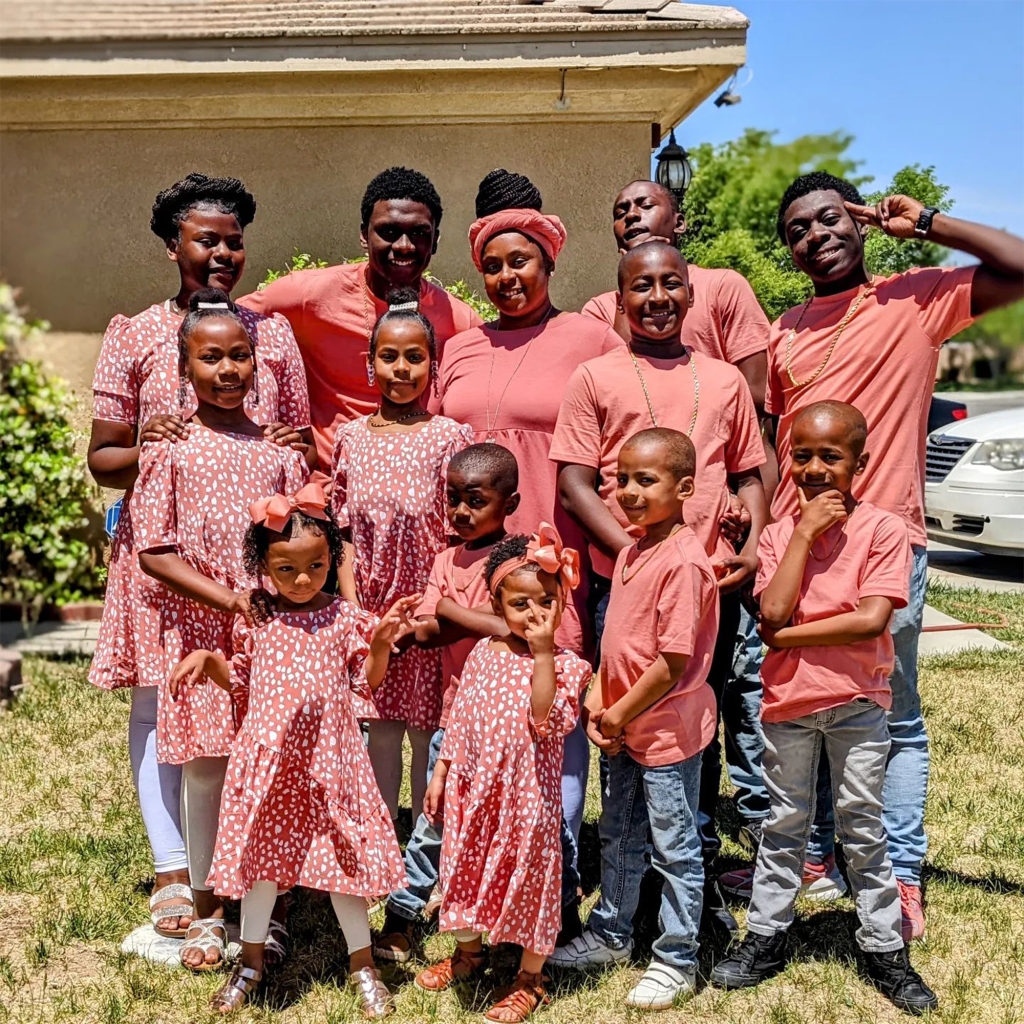 Iris is pictured in a Mother's Day snap with her 12 kids: Malikhai, 17, Junior, also 17, Jahni, 15, Trinity, 13, Messiah, 11, JoJo, 10, Love, 9, Seven, 8, Michael, 6, Royal, 5, Heavenly, 3 and Hope, 2.  