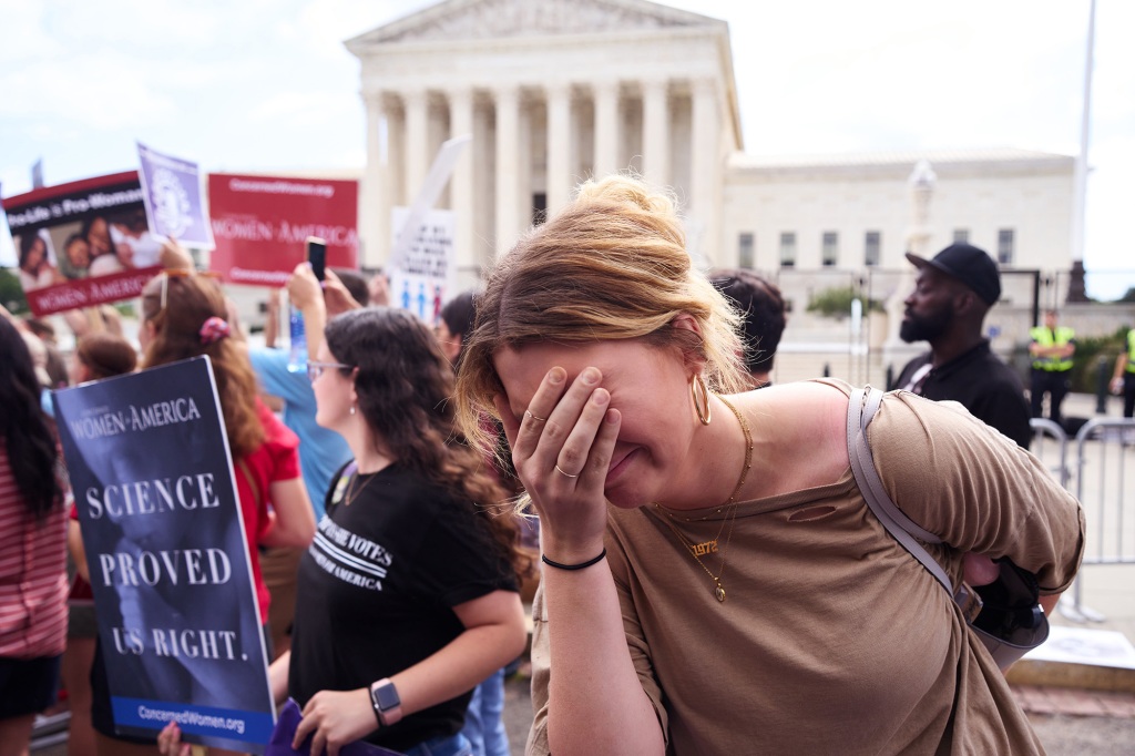 People seen outside the  Supreme Court after the overturning of Roe v Wade.