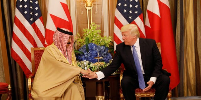 FILE - President Donald Trump meets with Bahrain's King Hamad bin Isa Al Khalifa in Riyadh, Saudi Arabia, May 21, 2017.