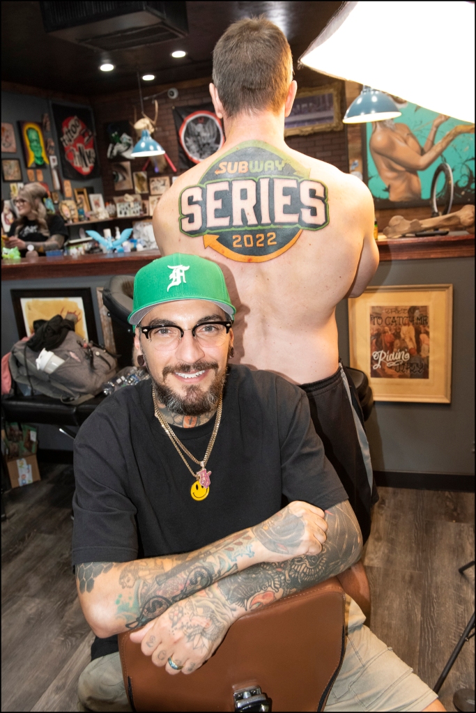 Kunz agreed to get a footlong tattoo of the logo across his back -- earning himself free subs for life.