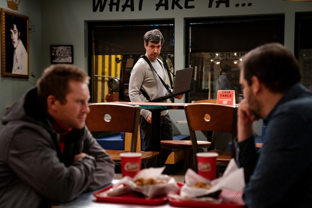 Nathan Fielder lurking outside of a window. 