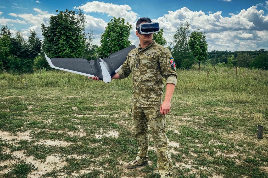 Ukrainian military forces lieutenant Anton Galyashinskiy aka "Wider" holds a Parrot drone during a practice session on the outskirts of Kyiv.