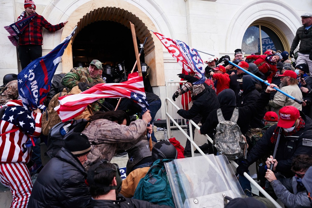 Protestors attacked a police officer at the Capitol on Jan. 6, 2021.