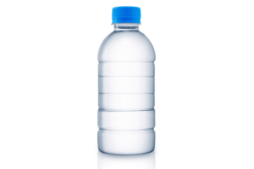 Empty clean and clear water bottle isolated on a white background