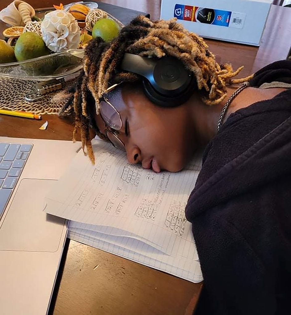 Alena Analeigh Wicker asleep on her school work