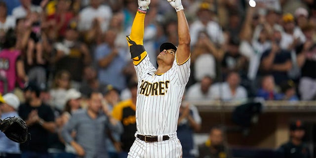 San Diego Padres' Juan Soto gestures after hitting a home run against the San Francisco Giants during the fourth inning of a baseball game Tuesday, Aug. 9, 2022, in San Diego. 