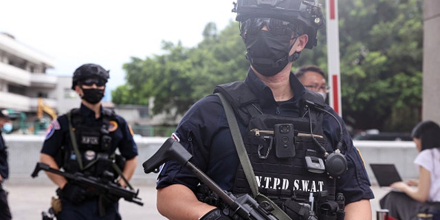 Taiwanese police officers on heightened alert after Taiwan is hit with multiple cyber attacks. Picture taken at the Jing-Mei Human Rights Memorial and Cultural Park in Taipei, Taiwan, on Wednesday, on Aug. 3, 2022. 