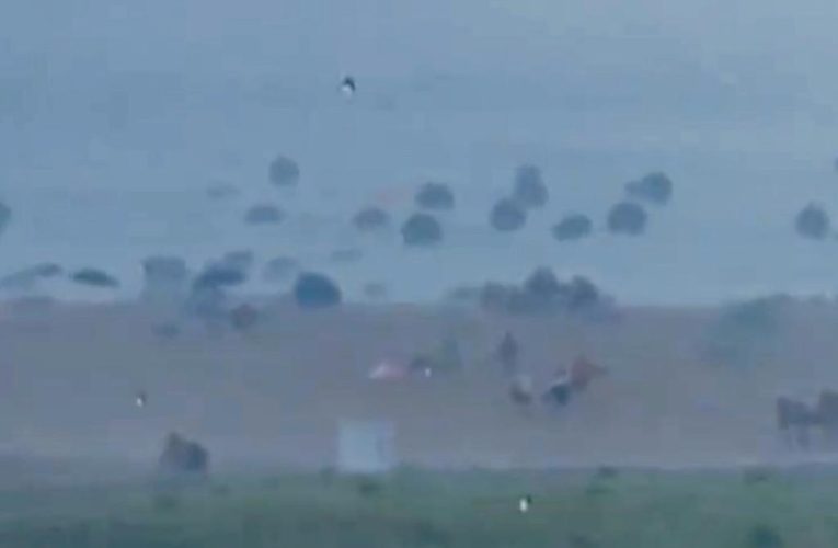 ‘Apocalyptic’ weather in Delaware sends beach umbrellas flying