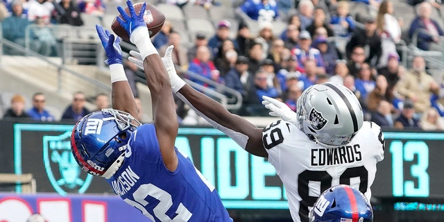 Las Vegas Raiders wide receiver Bryan Edwards, right, cannot catch a pass in the end zone as New York Giants cornerback Adoree' Jackson defends at MetLife Stadium, Nov. 7, 2021, in East Rutherford, New Jersey.