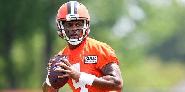 Cleveland Browns quarterback Deshaun Watson takes part in drills during the NFL football team's training camp, Monday, Aug. 1, 2022, in Berea, Ohio.