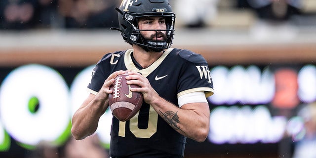 Wake Forest quarterback Sam Hartman, #10, throws a pass during the first half of an NCAA college football game against Duke on Saturday, Oct. 30, 2021, in Winston-Salem, North Carolina.