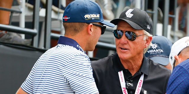 Greg Norman, CEO and commissioner of LIV Golf, and Talor Gooch during the LIV Golf Invitational on July 31, 2022, at Trump National Golf Club in Bedminster, New Jersey.