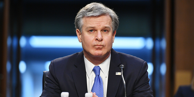 FBI Director Christopher Wray arrives to testify before the Senate Judiciary Committee in the Hart Senate Office Building on Capitol Hill in Washington, DC on March 2, 2021.