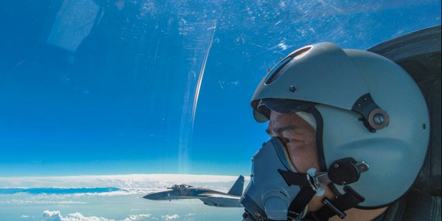 A Chinese air force pilot takes part in combat training exercises near Taiwan on Aug. 7, 2022. (Wang Xinchao/Xinhua via AP)