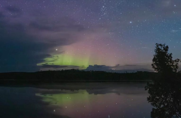 Lightning and aurora illuminate Minnesota sky above Lake Superior: video