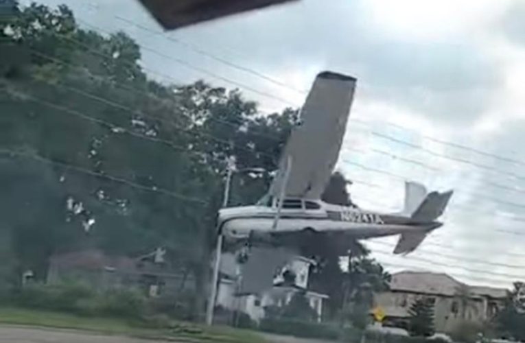 Plane crashes into busy road