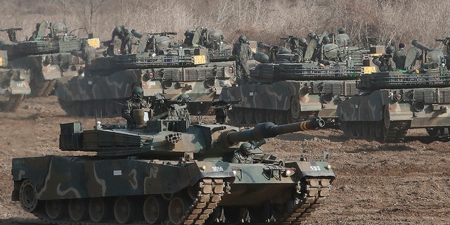 A South Korean army's K1A2 tank moves during a military exercise in Paju, South Korea, near the border with North Korea, Wednesday, March 17, 2021. 