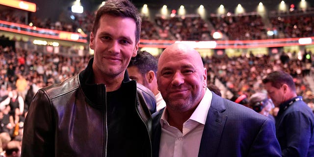 Tom Brady poses for a photo with UFC President Dana White during UFC 246 at T-Mobile Arena Jan. 18, 2020, in Las Vegas.