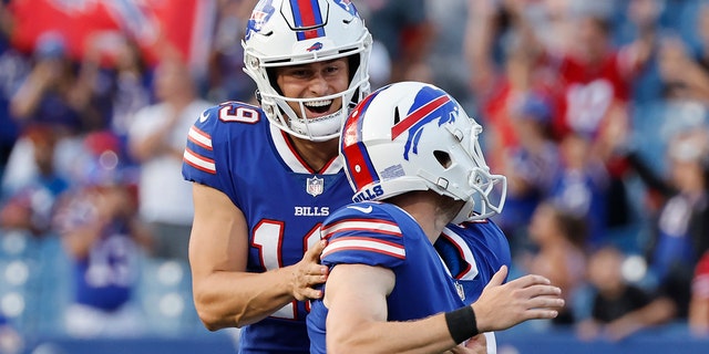 Buffalo Bills punter Matt Araiza, left, celebrates with place-kicker Tyler Bass after Bass kicked the go-ahead field goal in the second half of a preseason NFL game against the Indianapolis Colts in Orchard Park, N.Y., on Aug. 13, 2022.